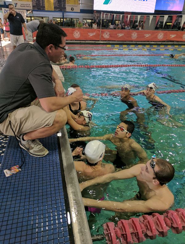 RMSC Coach Brian Cheng working with his crew.