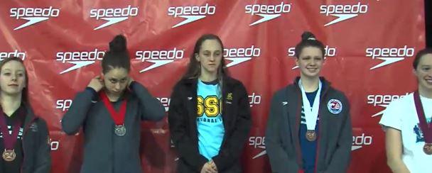 Phoebe Bacon (2nd from right) placed 3rd in 200 back.